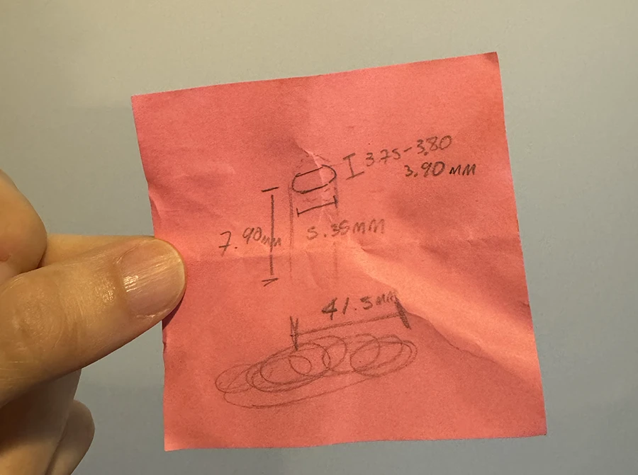 Hand made sketch with scribbled measurements.