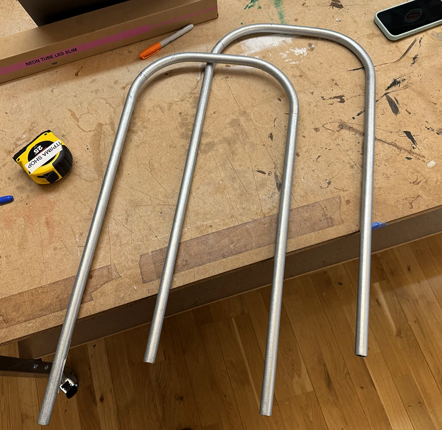Bent metal tubes.