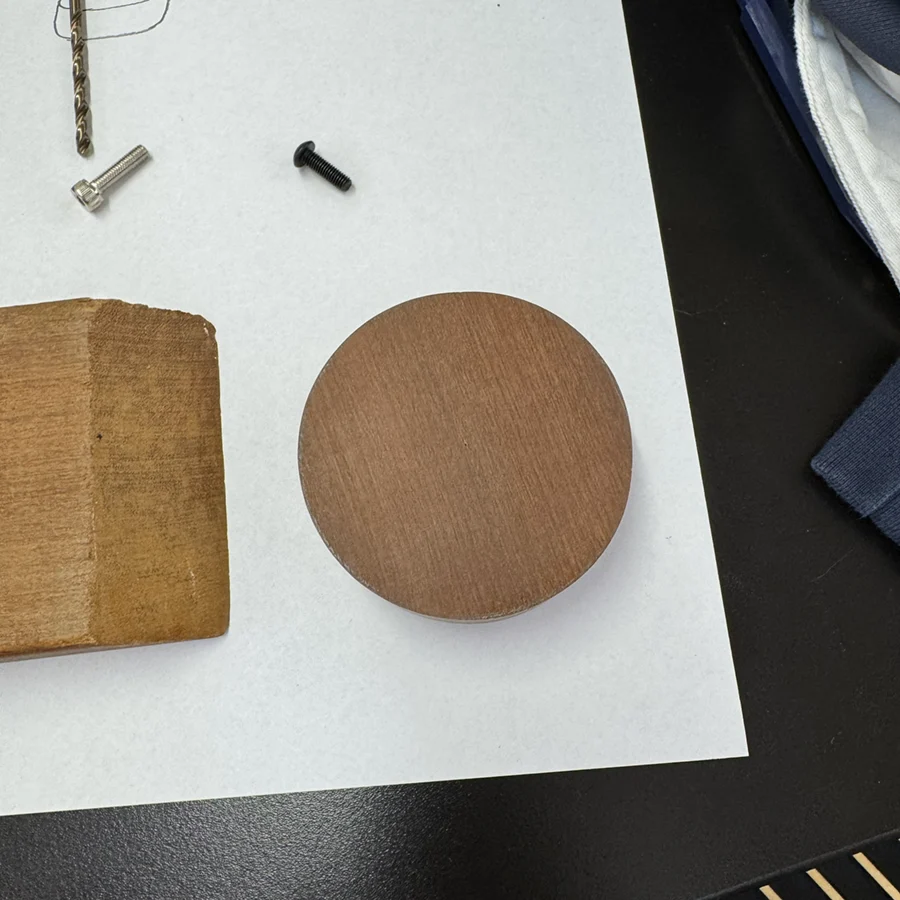 Circular piece of wood.