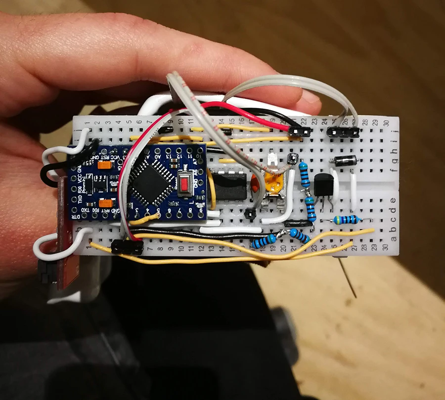 Arduino and other electronics on a breadboard.