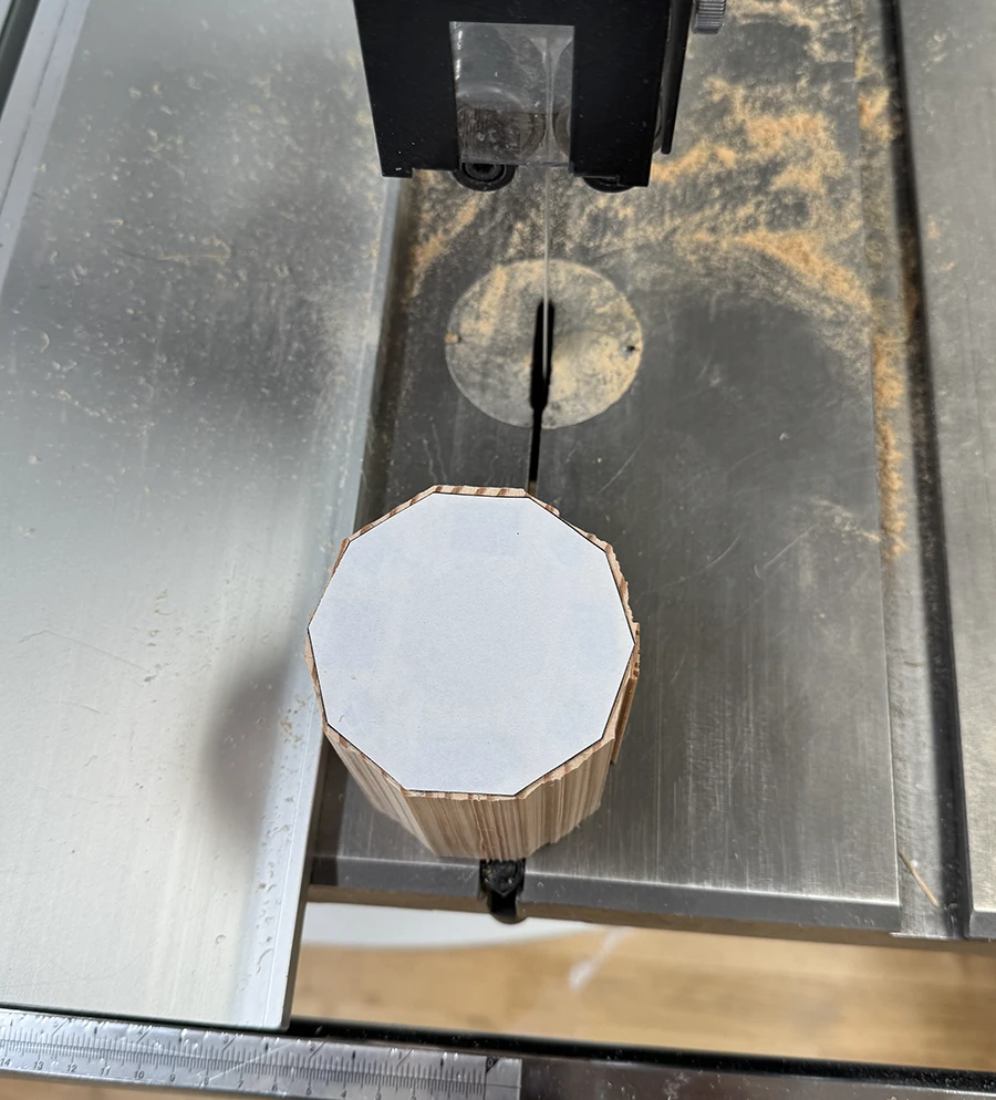 Wooden decagonal prism on the band saw.