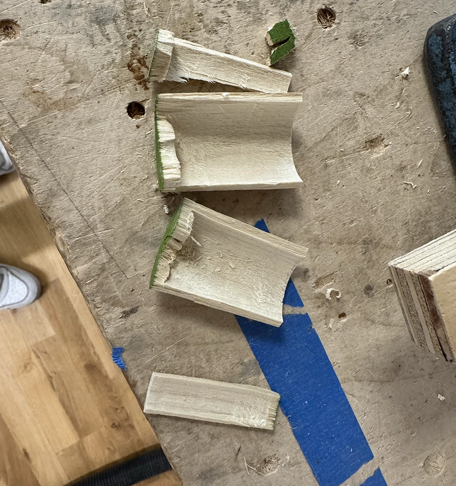 Dowel broken into pieces.