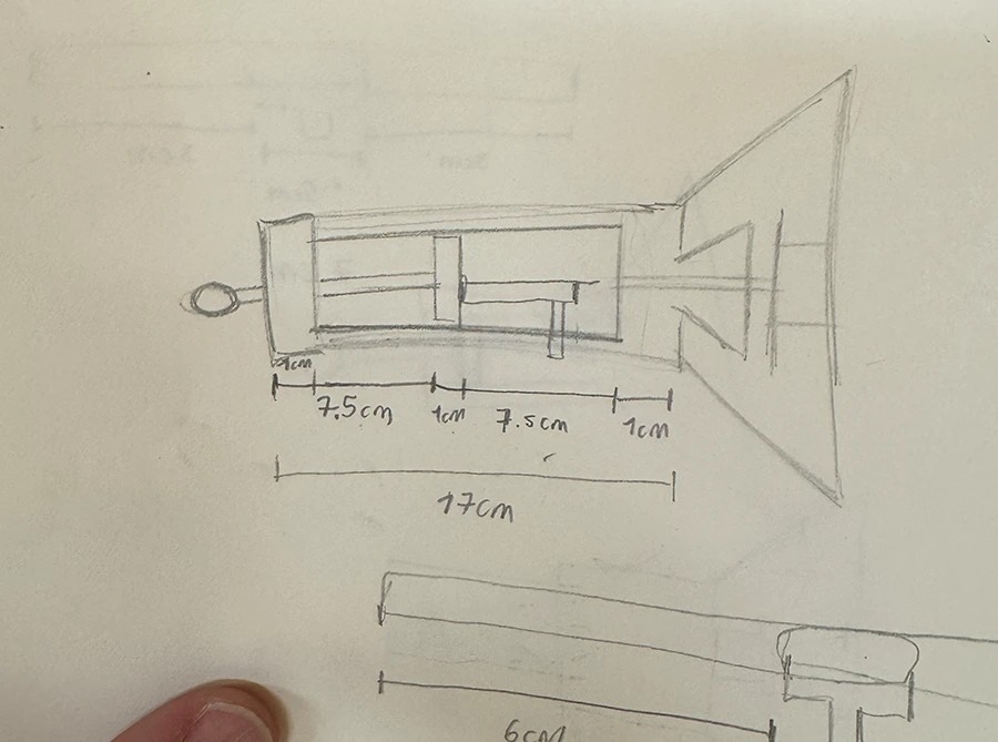 Section view sketch of a flashlight.