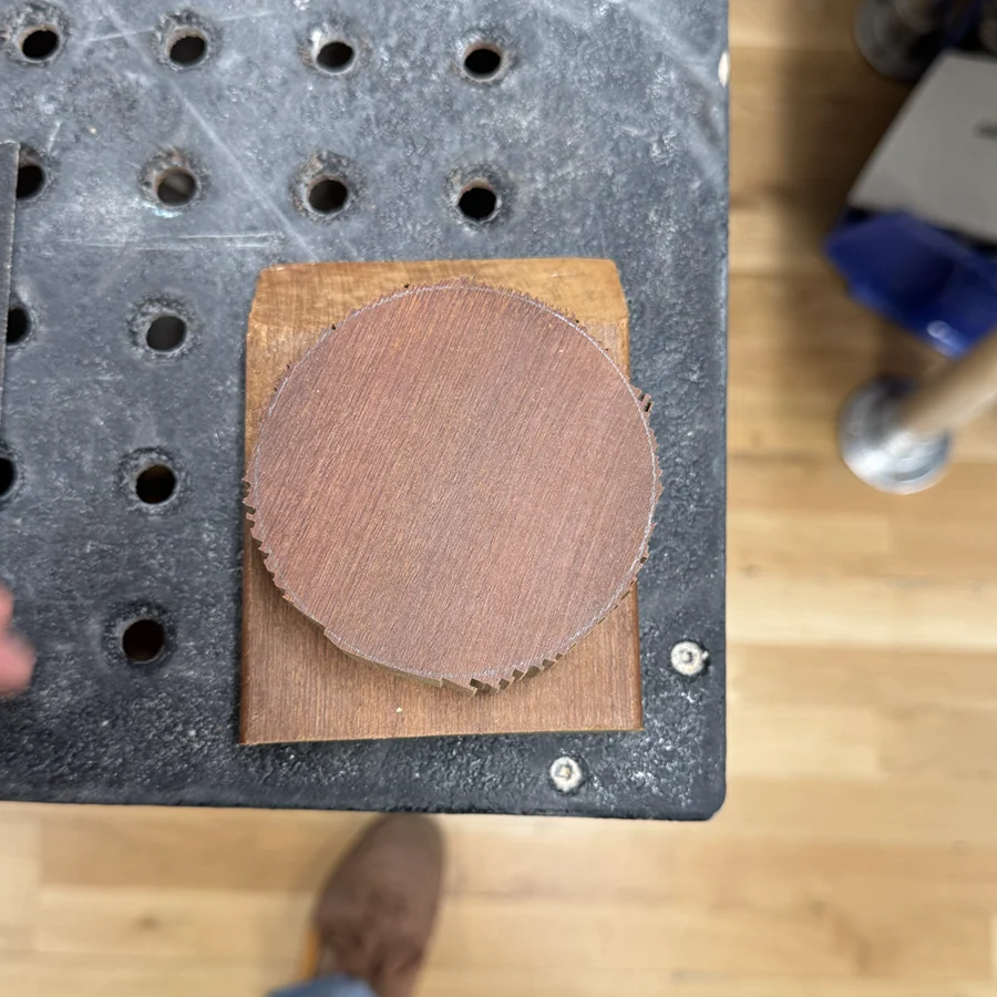 Rough cut of a circle of wood.