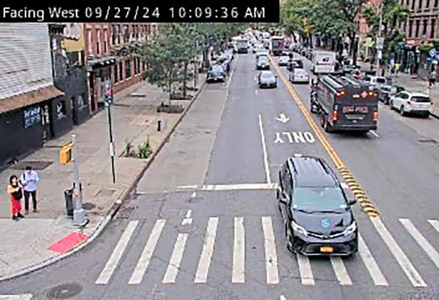 Low resolution photo of a crosswalk.