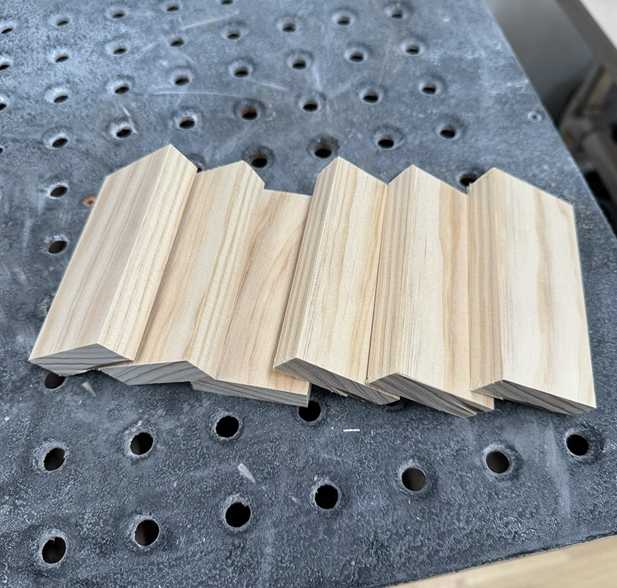 Six small blocks of wood of identical sizes.