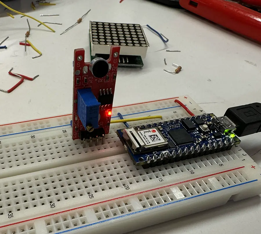 Sound sensor and arduino on a breadboard.