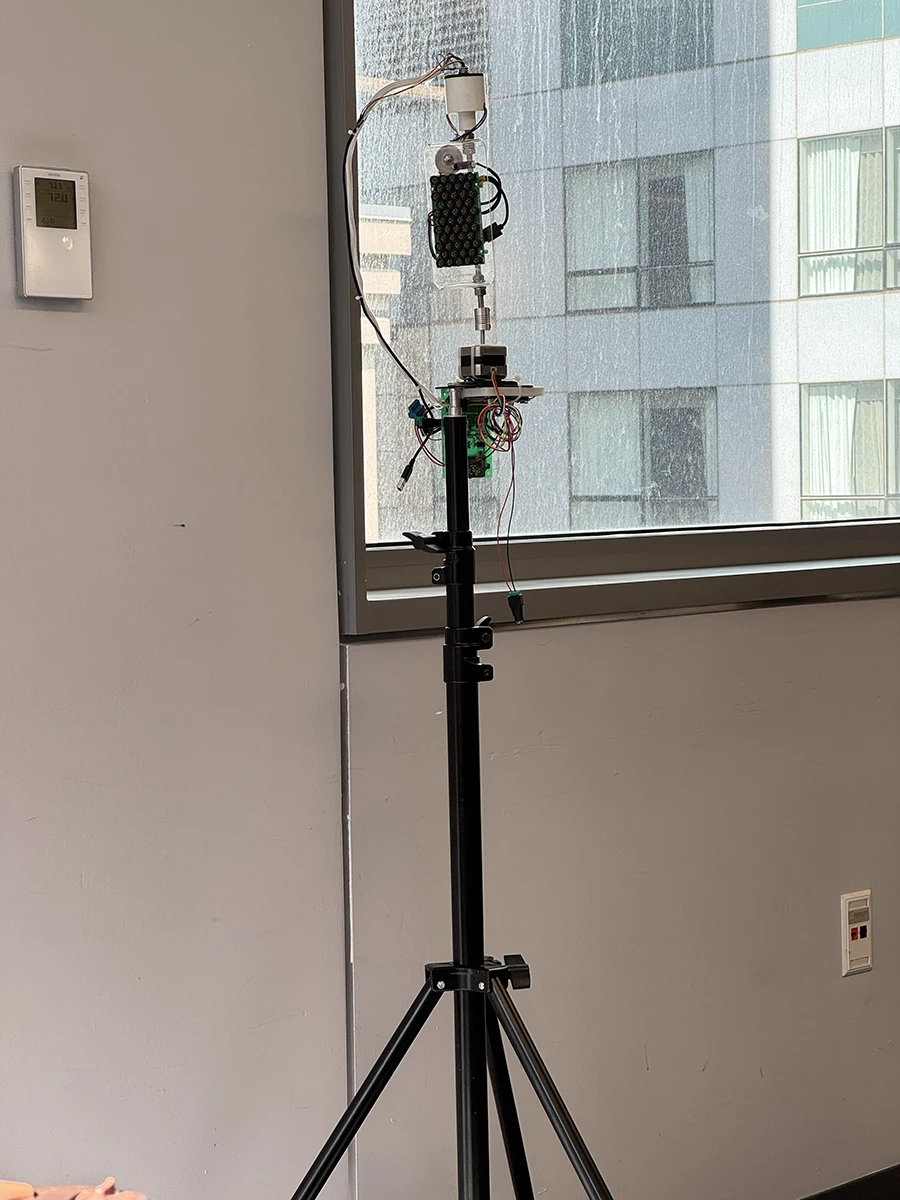 Parametric speaker on a light stand.