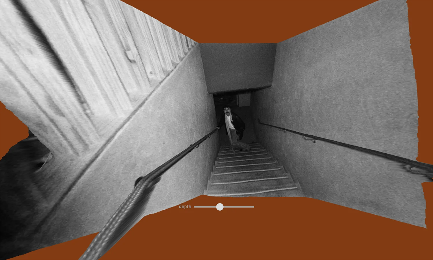 Man walking up a staircase.