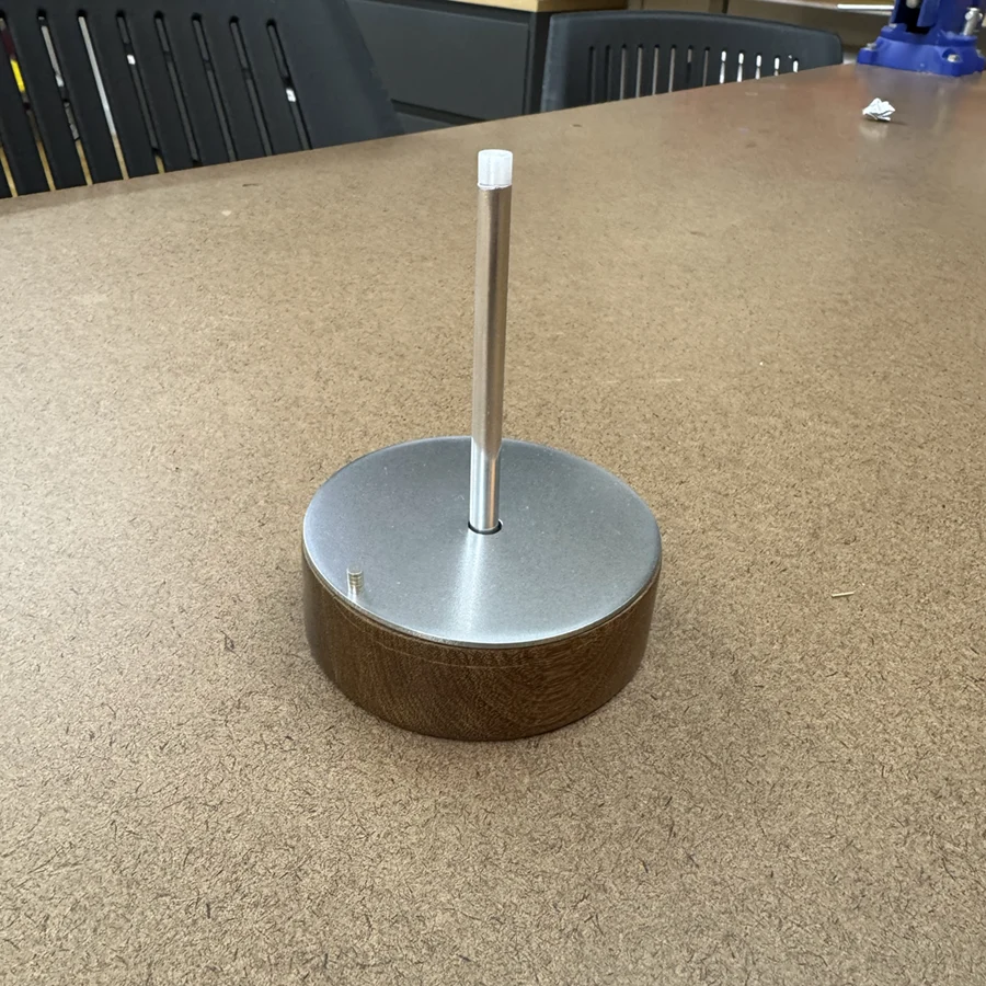 Wood and metal sundial.