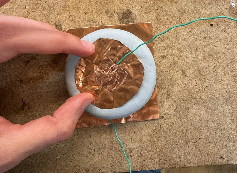Copper plate with a wire connected with copper tape. All on top of the foam piece.